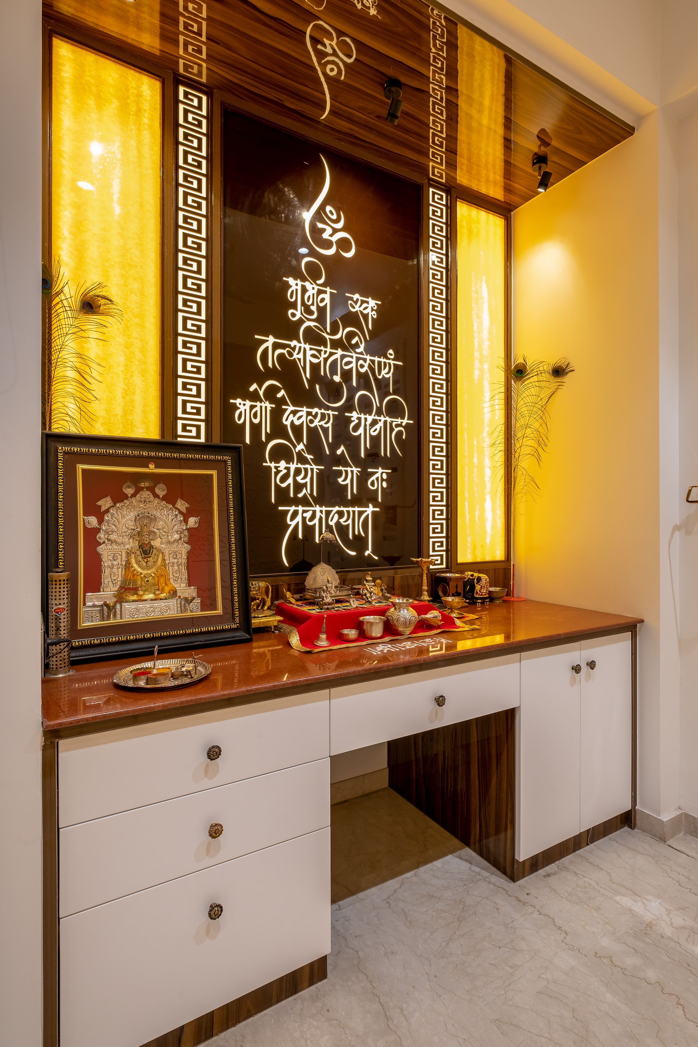 Modern Pooja Room Design Integrated With A Spacious Storage Unit
                
