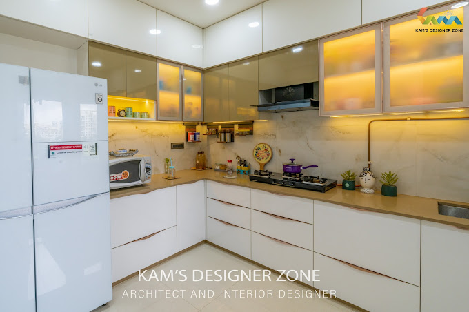 A Fantastic Modular Kitchen in white and Golden Shade
                    