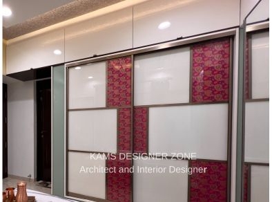 Stylish 2 - Door Reddish and White Slide wardrobe Design with extra loft storage 

                